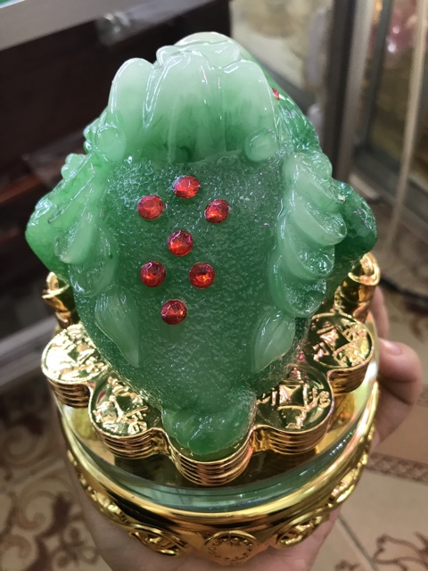 Ông cóc ngậm tiền đế xoay