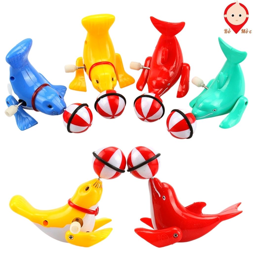 Đồ Chơi Cá Heo Vặn Cót Xoay Bóng 360 Độ - Hải Cẩu Biểu Diễn Xiếc Cho Bé - Shop Bố Mốc
