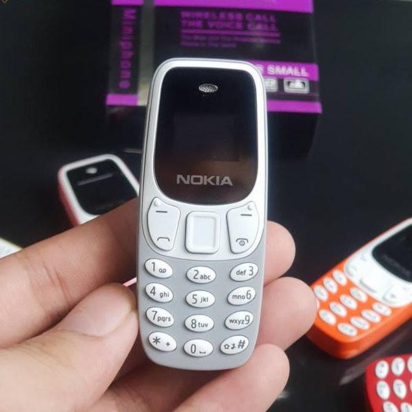 Điện thoại mini nokia 3310 2 sim 2 sóng cực khỏe, hỗ trợ nghe nhạc mp3,giả giọng,thay thế tai nghe blutooth