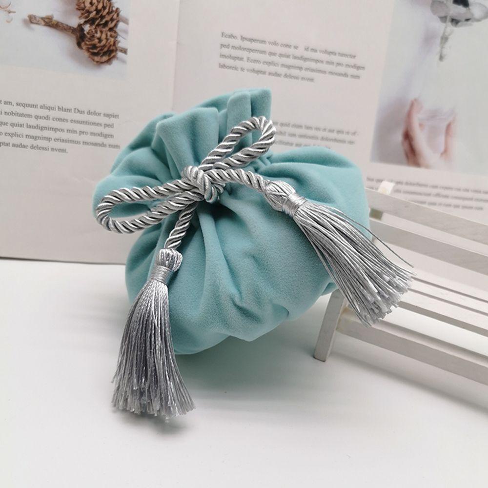 Túi Nhung Đựng Trang Sức Đế Tròn Phối Tua Rua Xinh Xắn