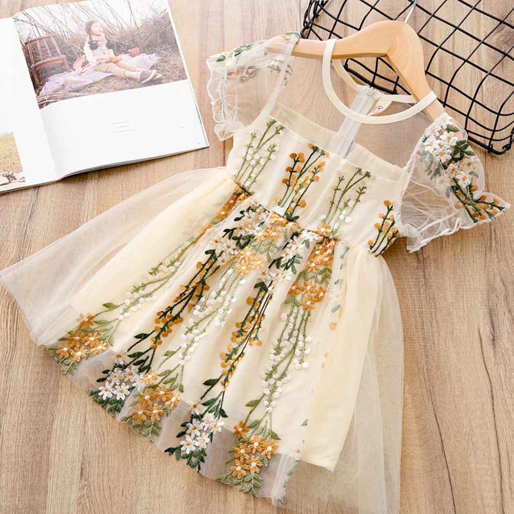 Đầm công chúa in hình khủng long cho bé gái