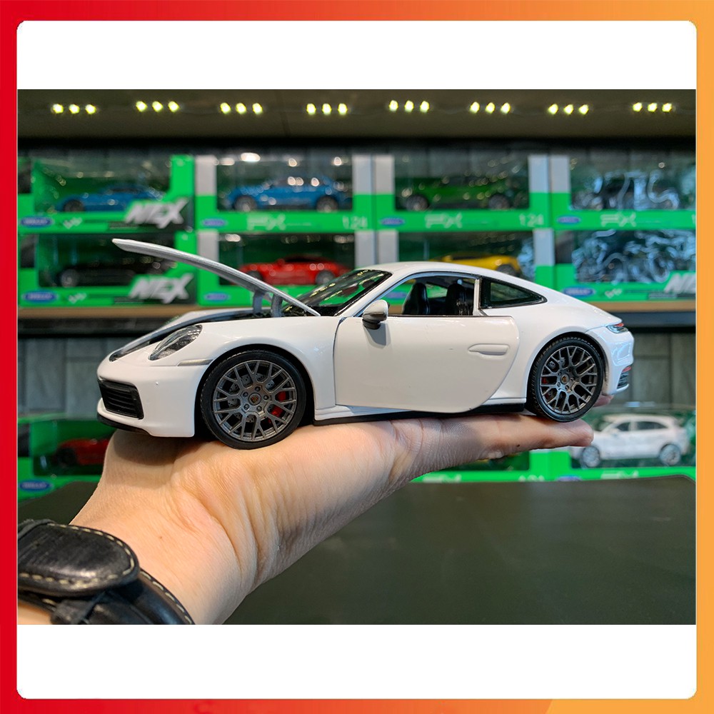 Mô hình xe Porsche 911 Carrera 4S tỉ lệ 1:24 hãng Welly[Fullbox]