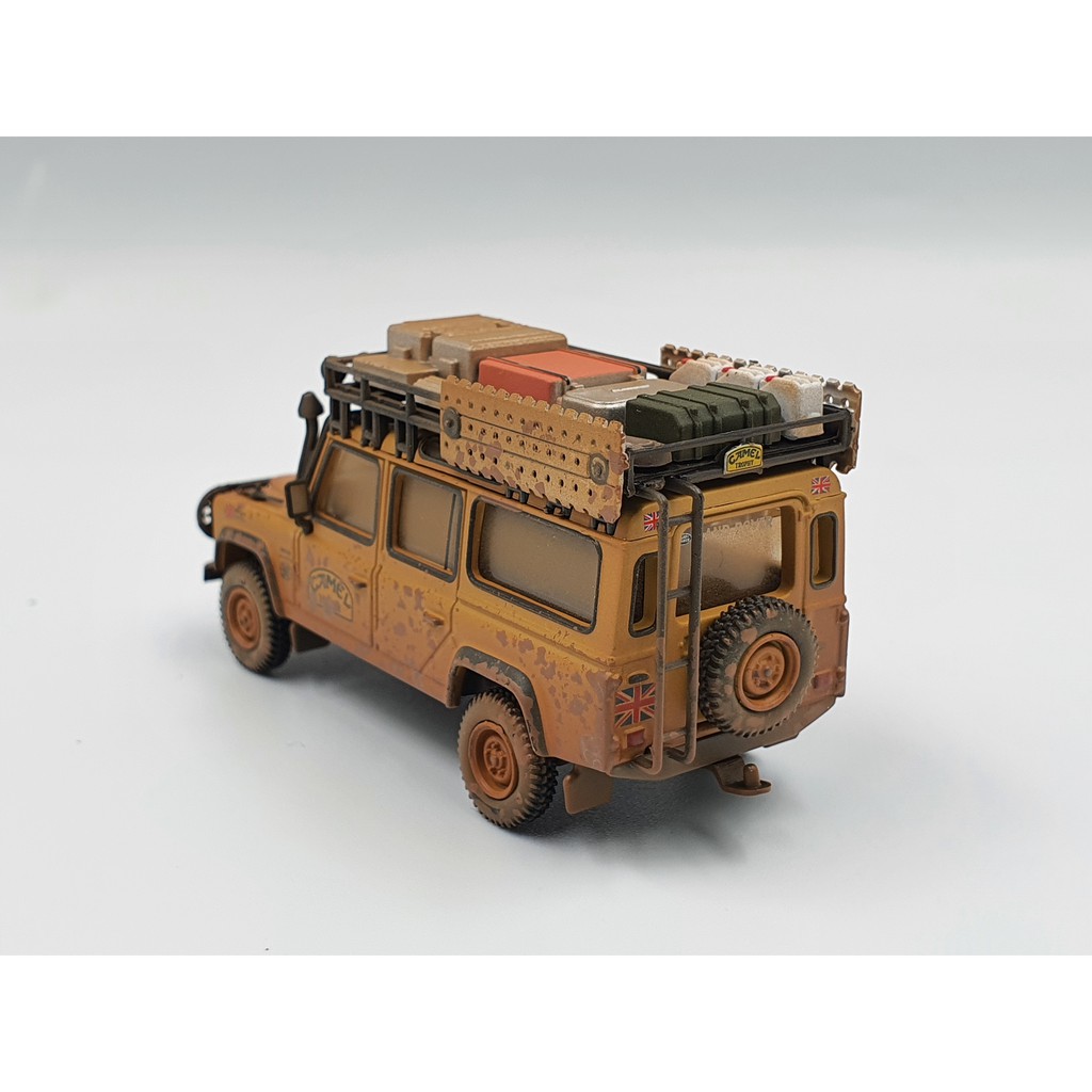 Xe Mô Hình Land Rover Defender 110 1989 Camel Trophy Winner Team UK RHD Tỉ lệ 1:64 Hãng sản xuất MiniGT ( Vàng Bụi )