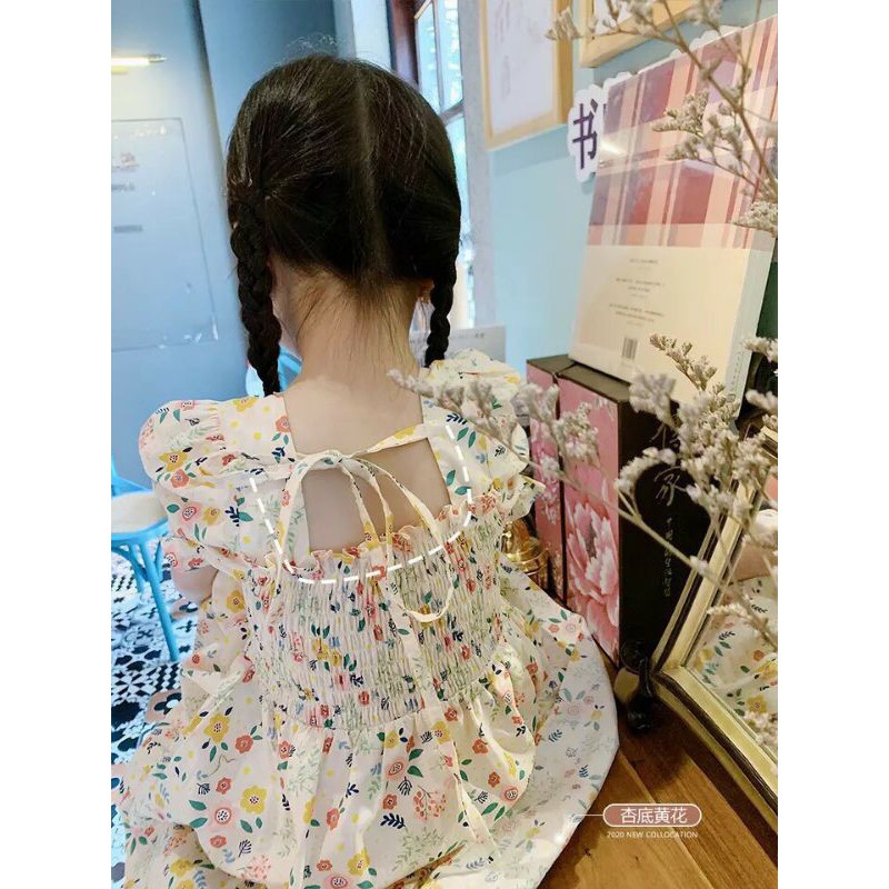 Váy hoa nhí chun ngực nơ lưng cho bé gái(10-23kg)