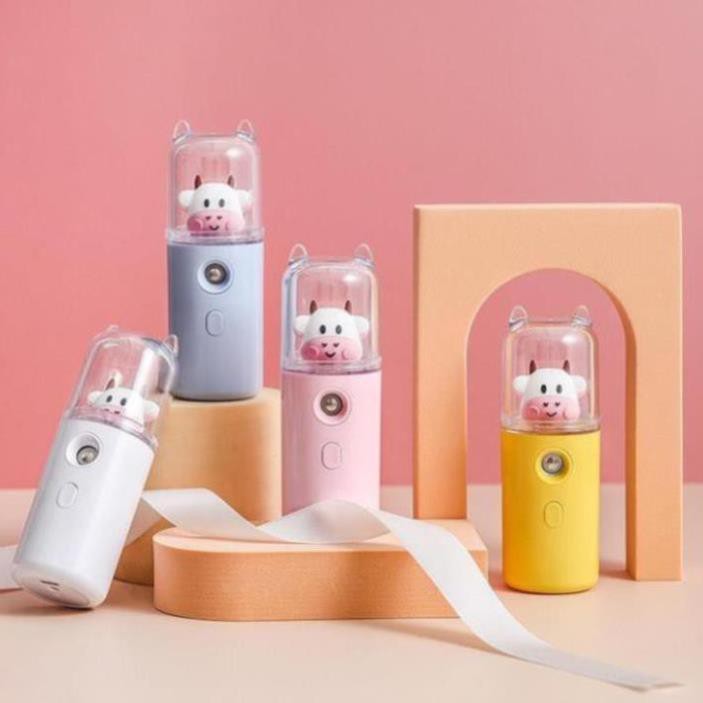 Máy phun sương mini cầm tay hình chú bò sữa