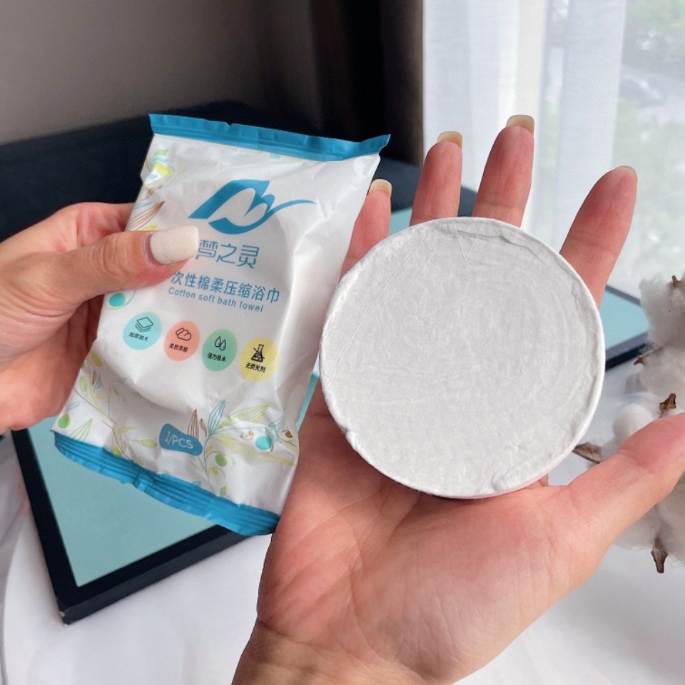 Khăn tắm viên nén du lịch nhỏ gọn tiện dụng chất liệu cotton dùng 1 lần size 140x70cm