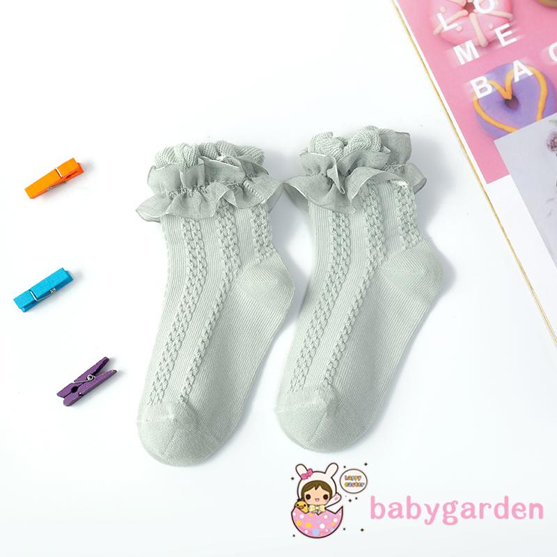 Tất ống ngắn màu trơn chống trượt phối hình dệt kim dành cho bé gái