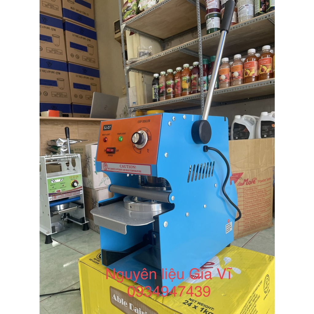 Máy ép miệng ly nhựa SHUNJI