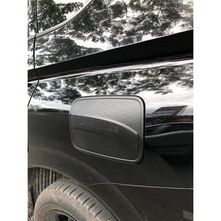 Ốp nắp bình xăng Xpander - màu đen
