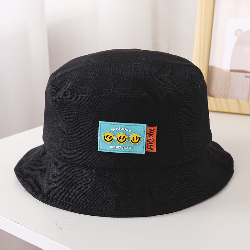 Mũ bucket da họa tiết mặt cười dễ thương cho bé