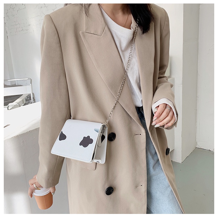 Túi xách nữ đeo chéo mini họa tiết bò sữa dây đeo chuỗi xích cá tính