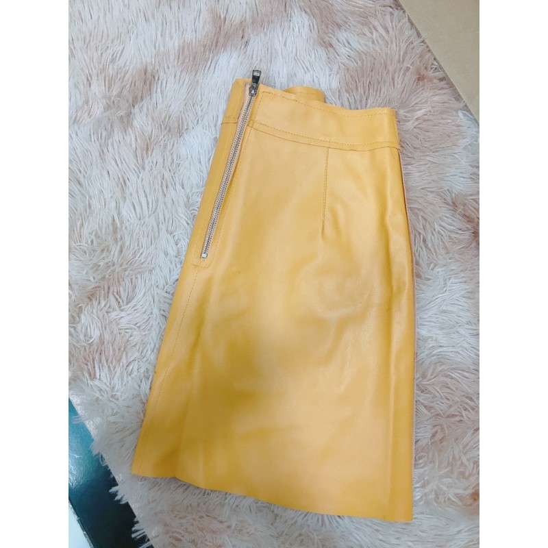 Thanh lý chân váy da màu vàng cam size xs