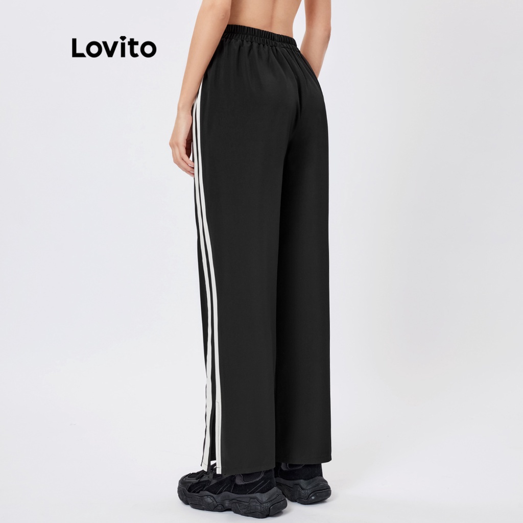 Quần Lovito màu trơn xẻ gấu phối viền tương phản phong cách thể thao L26AD073 (màu đen)