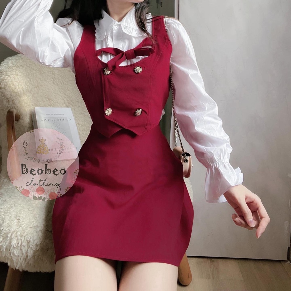 Set áo sơ mi tay phồng phối áo gile nút kèm chân váy chữ A