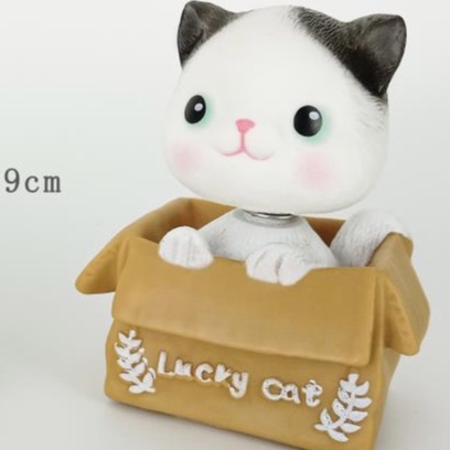 Mèo ngồi giỏ trang trí bánh kem