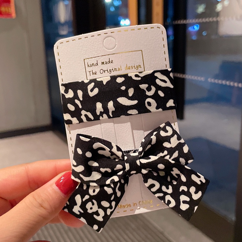 Kẹp tóc hình nơ họa tiết da báo phong cách retro dành cho nữ