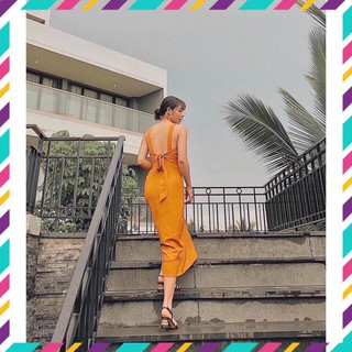 Đầm maxi vàng hở lưng cột nơ sau xinh xinh