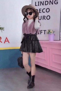 Đầm gile lông da.