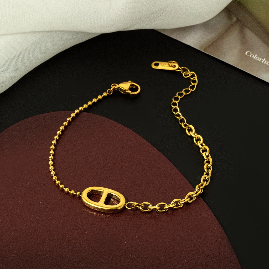 Vòng đeo tay thép titan mạ vàng 18K thiết kế mũi heo đẹp đơn giản bất đối xứng làm quà tặng sinh nhật cho bạn gái