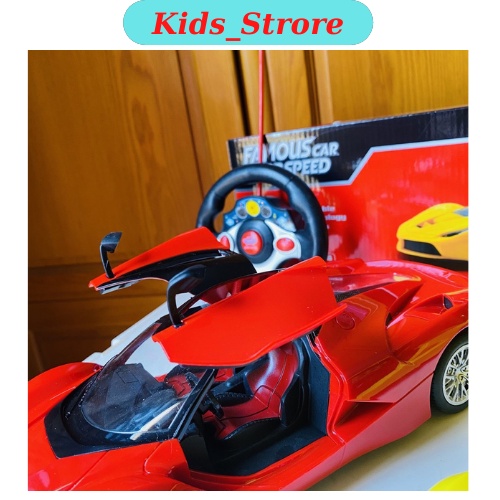 Ô tô điều khiển từ xa Ferrari 1:14 dài 30cm, có tặng kèm pin sạc