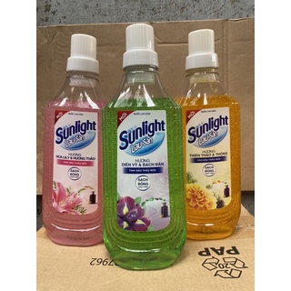 Nước lau sàn Sunlight chai 1kg có 3 mầu như hình
