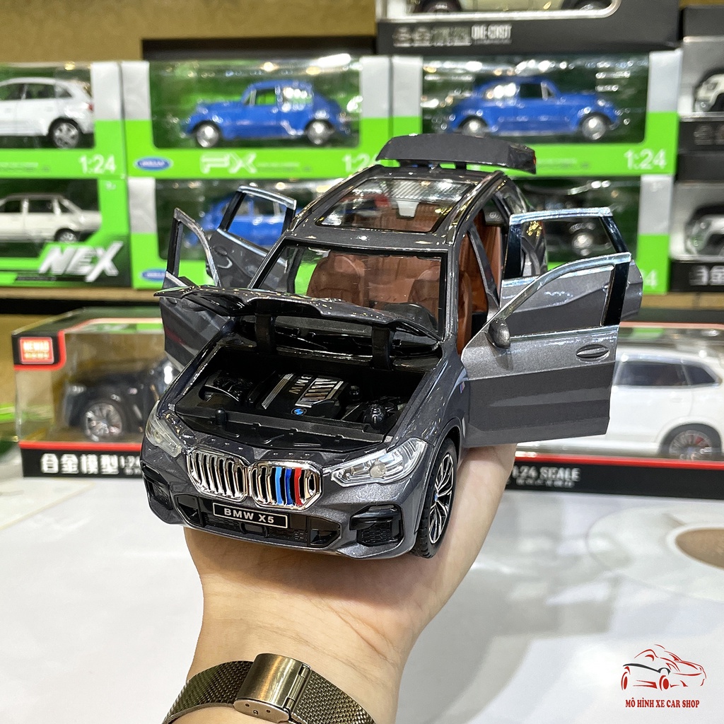 Mô hình xe ô tô hợp kim BMW X5 Driver tỉ lệ 1:24 đánh lái, bấm còi hãng Newao 3 màu