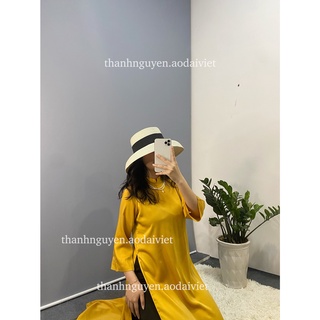 Áo dài vàng cách tân tay loe lụa Ngọc Trai