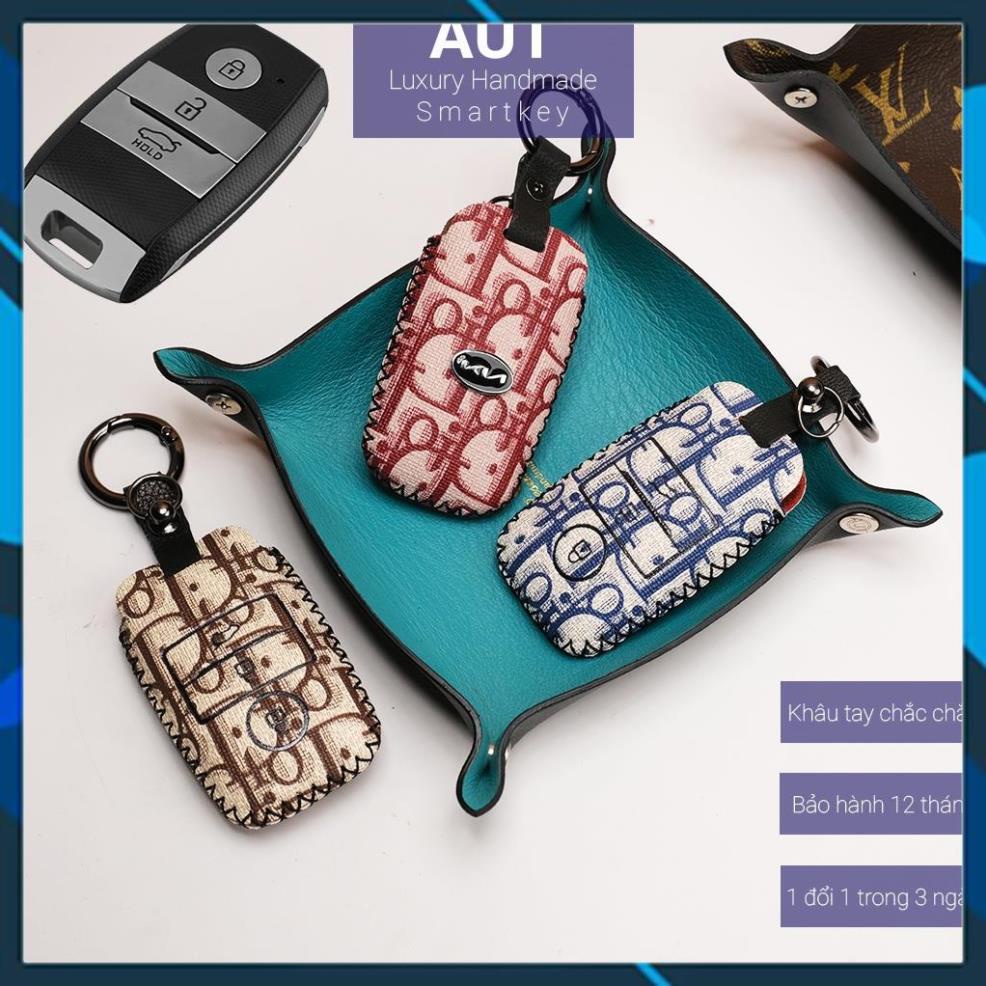 Bao da chìa khóa ô tô KIA Seltos Cerato Rio Rondo Soluto 3 nút bấm Dior khâu tay móc A KMK3