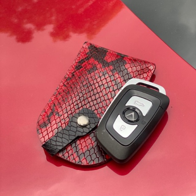 Móc khoá da dập vân trăng