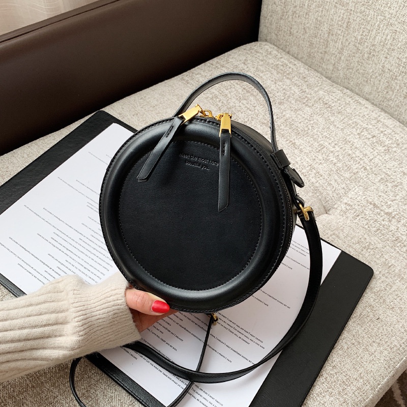 Korean niche design round cake simple retro handbag one shoulder under the bag women's apple small round bag