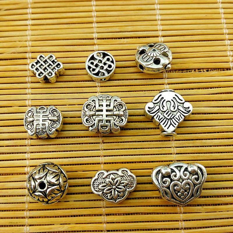 1 charm hạt xỏ hoa văn bạc tây tạng nguyên liệu làm trâm làm trang sức cổ trang