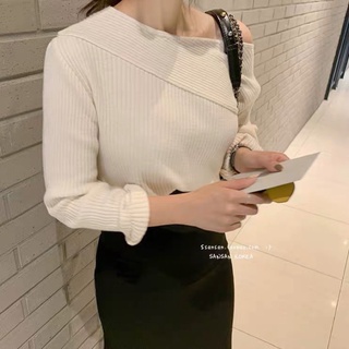 Áo len tăm phối cổ vạt lệch xẻ tà