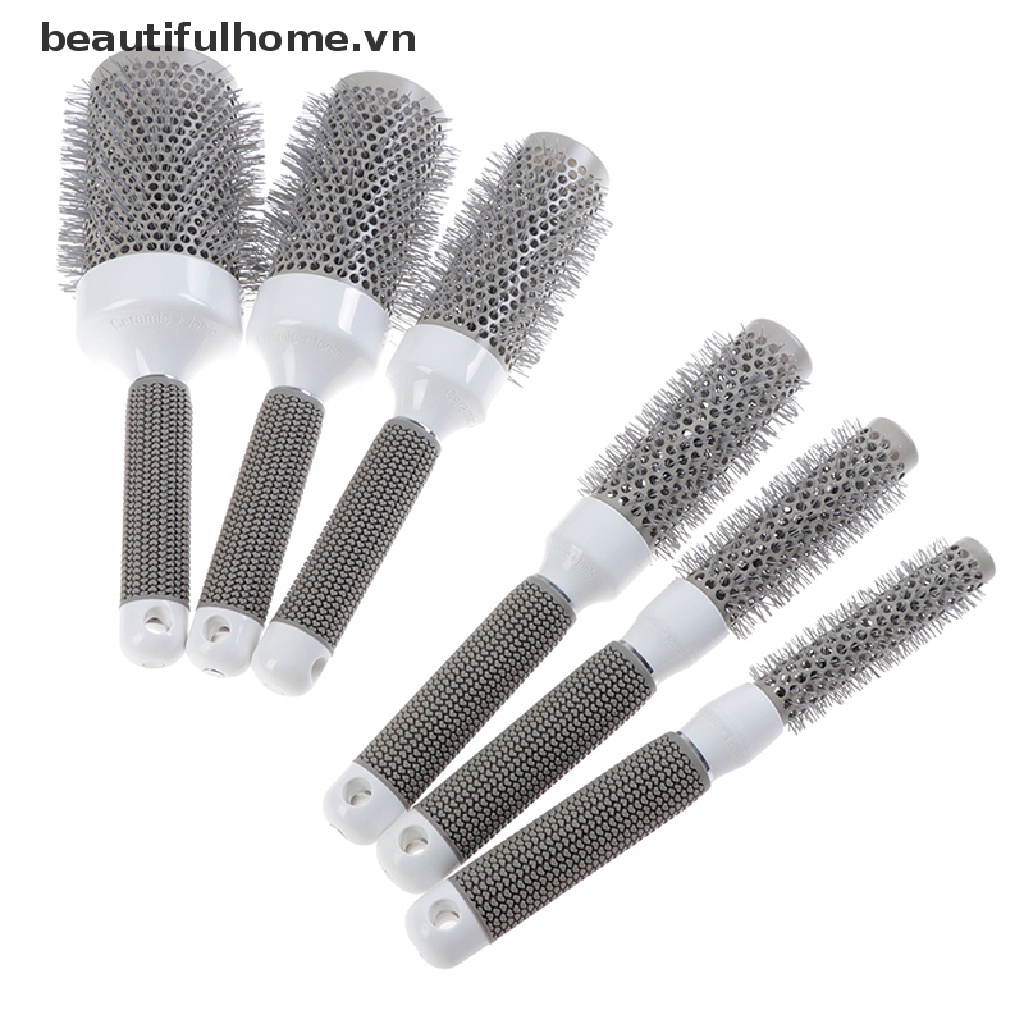 Lược chải tóc ion hình trụ tròn bằng sứ chuyên nghiệp<br />
