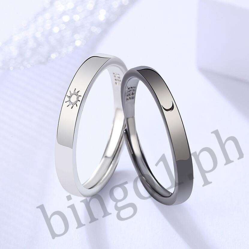 Nhẫn Đôi Màu Trắng Đen Hình Mặt Trời Và Ngôi Sao