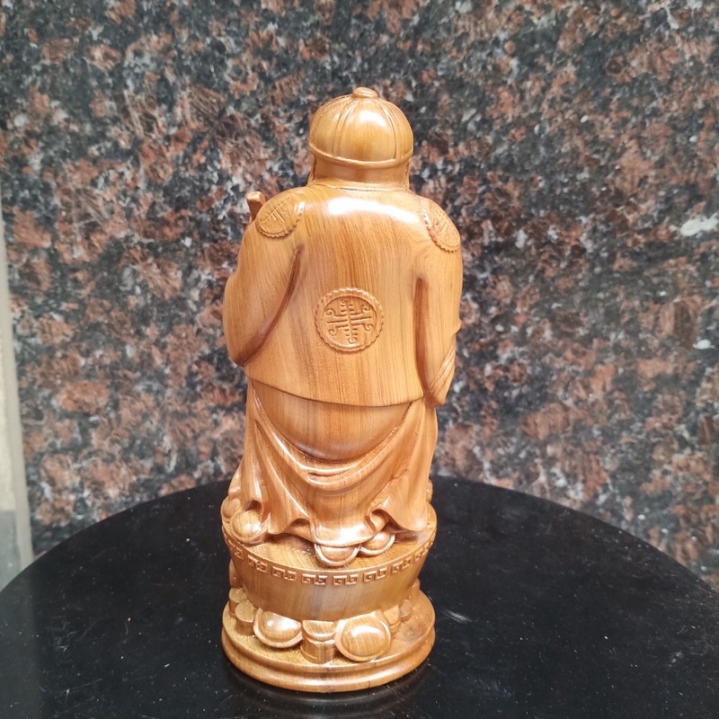 tượng ông quản gia gỗ bach xanh