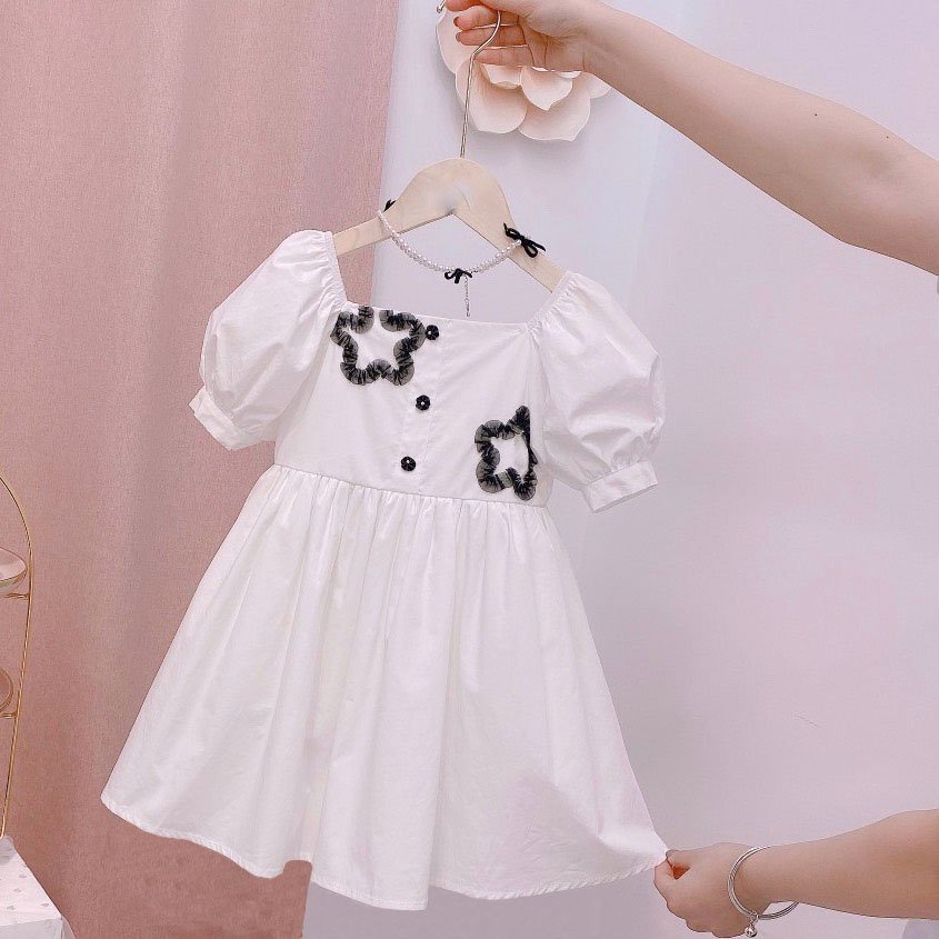  Váy đầm bé gái dáng suông hoạt tiết hoa đính cúc vải thô cao cấp Sunkid VH3 màu trắng 4-12 tuổi