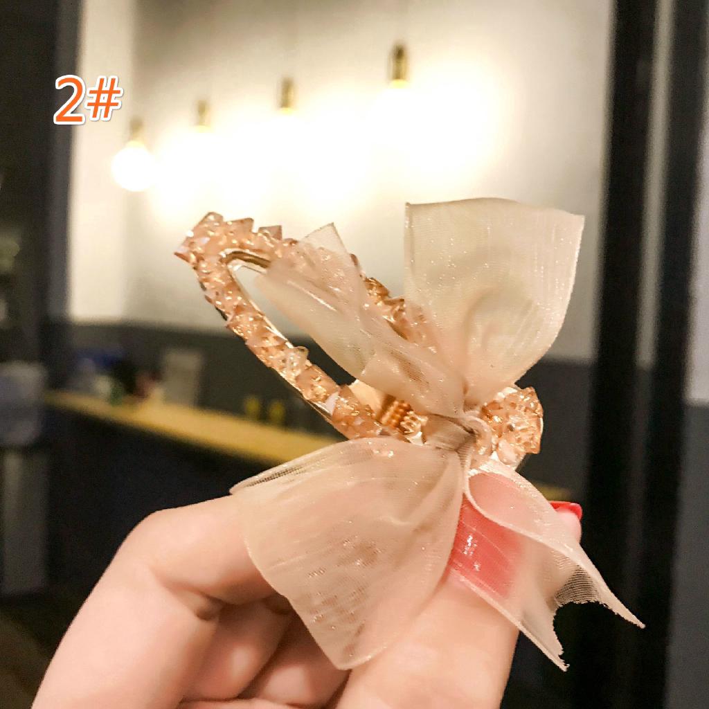 Kẹp tóc nơ đính đá thời trang nữ