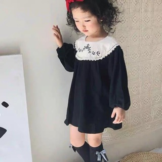 Váy đen thêu hoa dành cho bé yêu