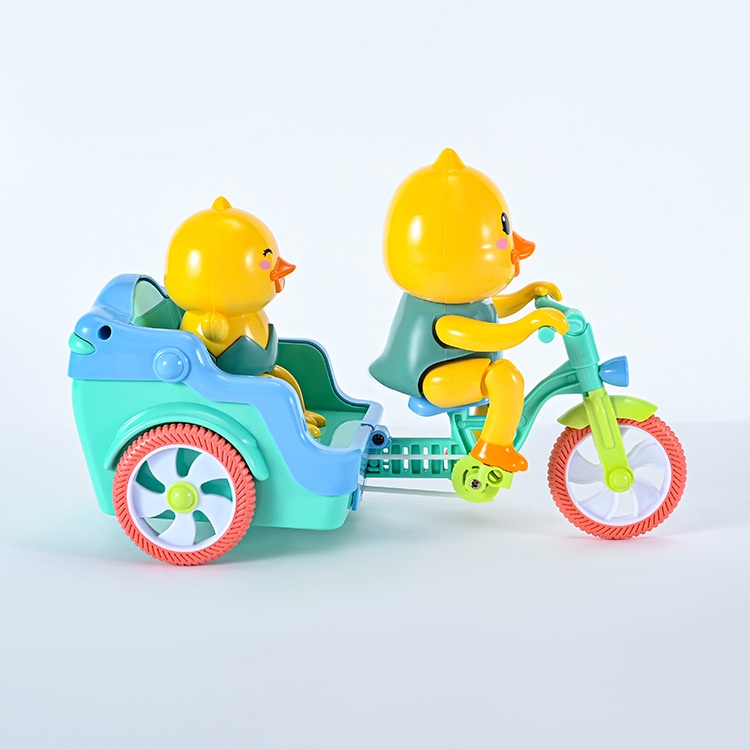 Đồ chơi vịt đạp xe có đàn nhạc vui nhộn bánh xe phát sáng - vịt chạy xe nhựa an toàn cho bé