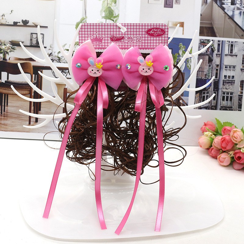 Kẹp tóc đính nơ dễ thương cho bé gái