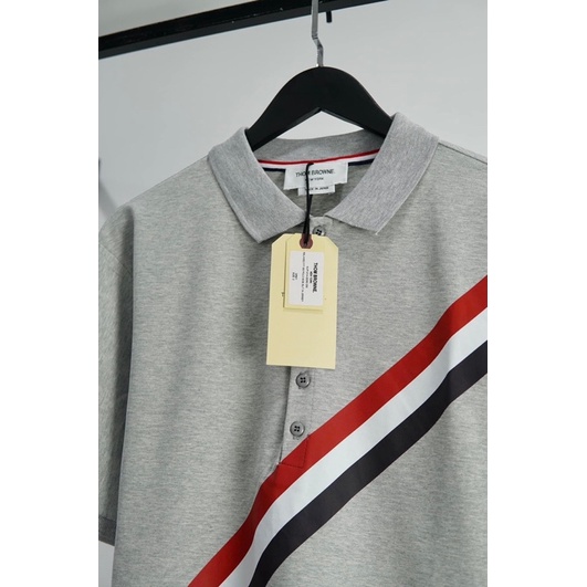 Áo Polo Thom Browne sọc chéo ngực hot hit nhất 2022