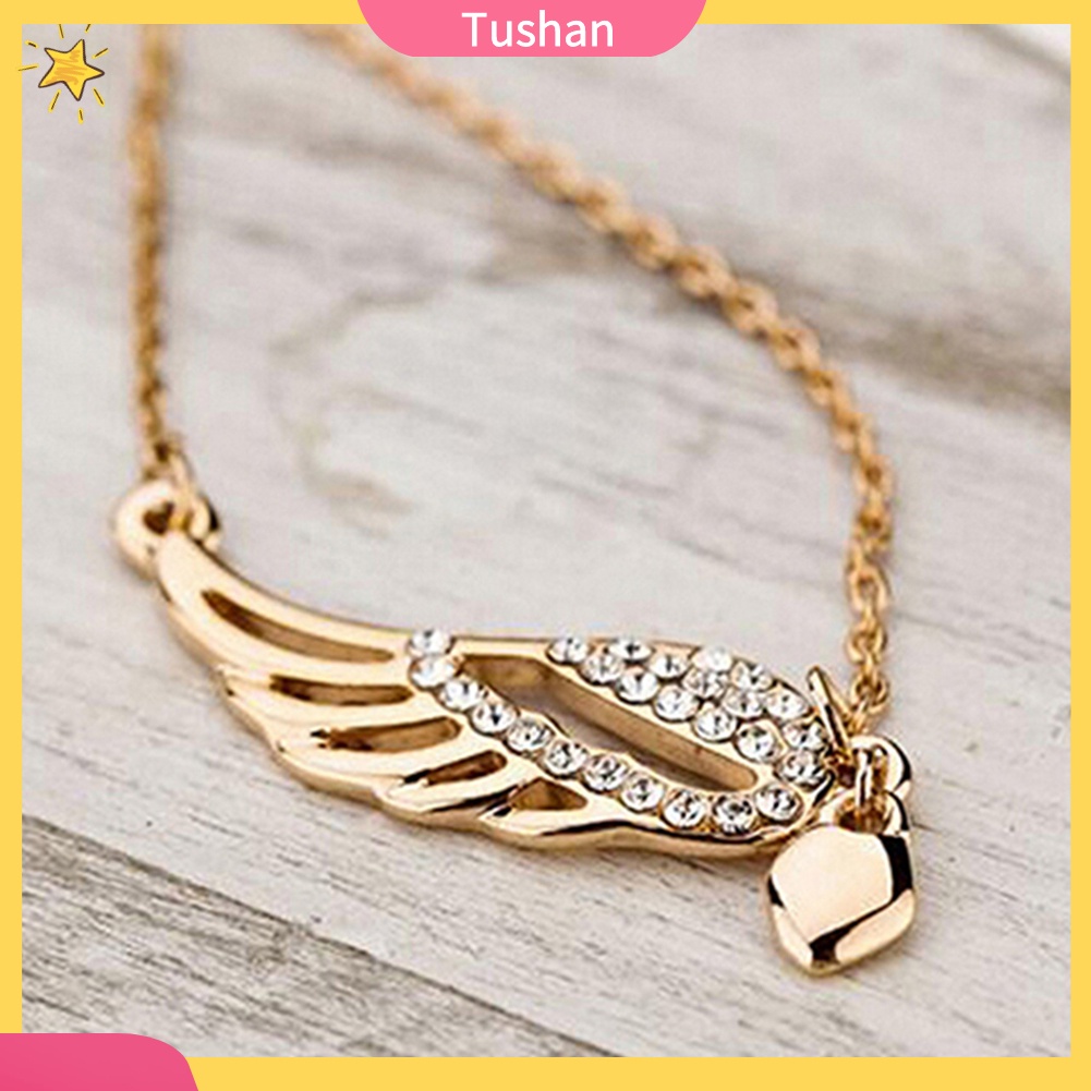 Dây chuyền mặt trái tim và đôi cánh thiên thần tush _