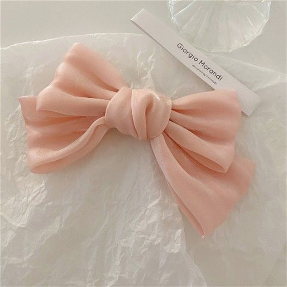Kẹp tóc hình nơ dễ thương dành cho nữ