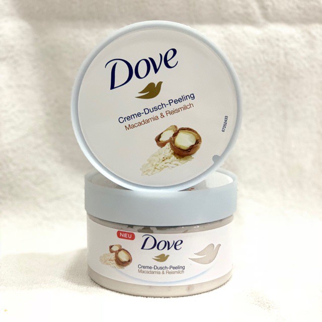 Kem dưỡng tẩy tế bào chết body Dove Creme Dusch Peeling Maccadamia Reismilch 298g hương macca và sữa gạo