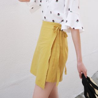 Chân váy buộc nơ vạt xinh xắn