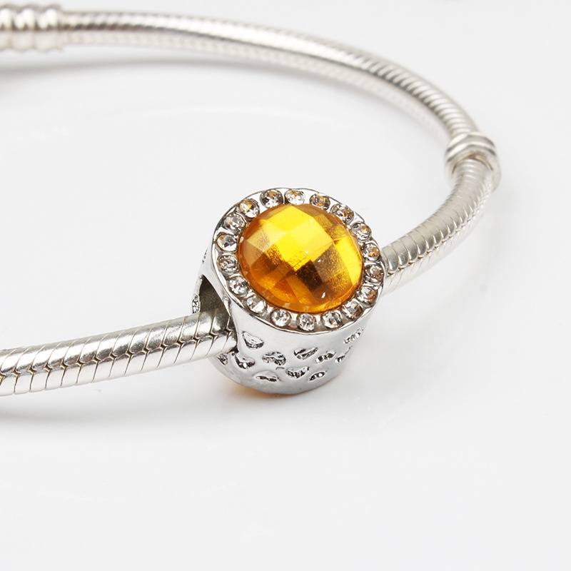 Hạt charm trụ đính đá