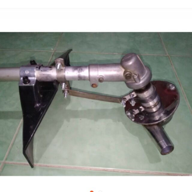 máy bơm nước gắn máy cắt cỏ