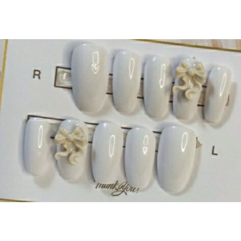 Nail box thiết kế trắng nơ