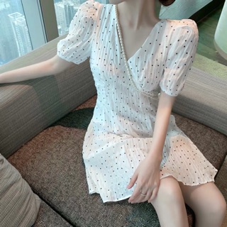 Váy xoè chấm bi nhỏ thắt nơ sau