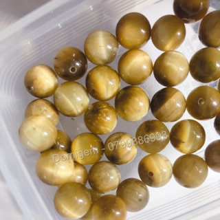 Hạt đá màu vàng mix vòng tay (1 hạt)